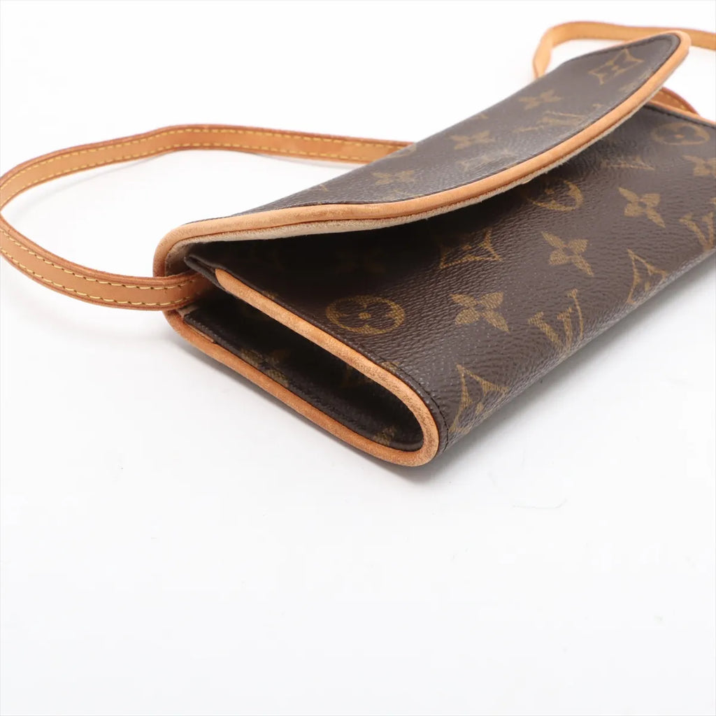 Sac Monogram Pochette Twin PM en toile Monogram Marron