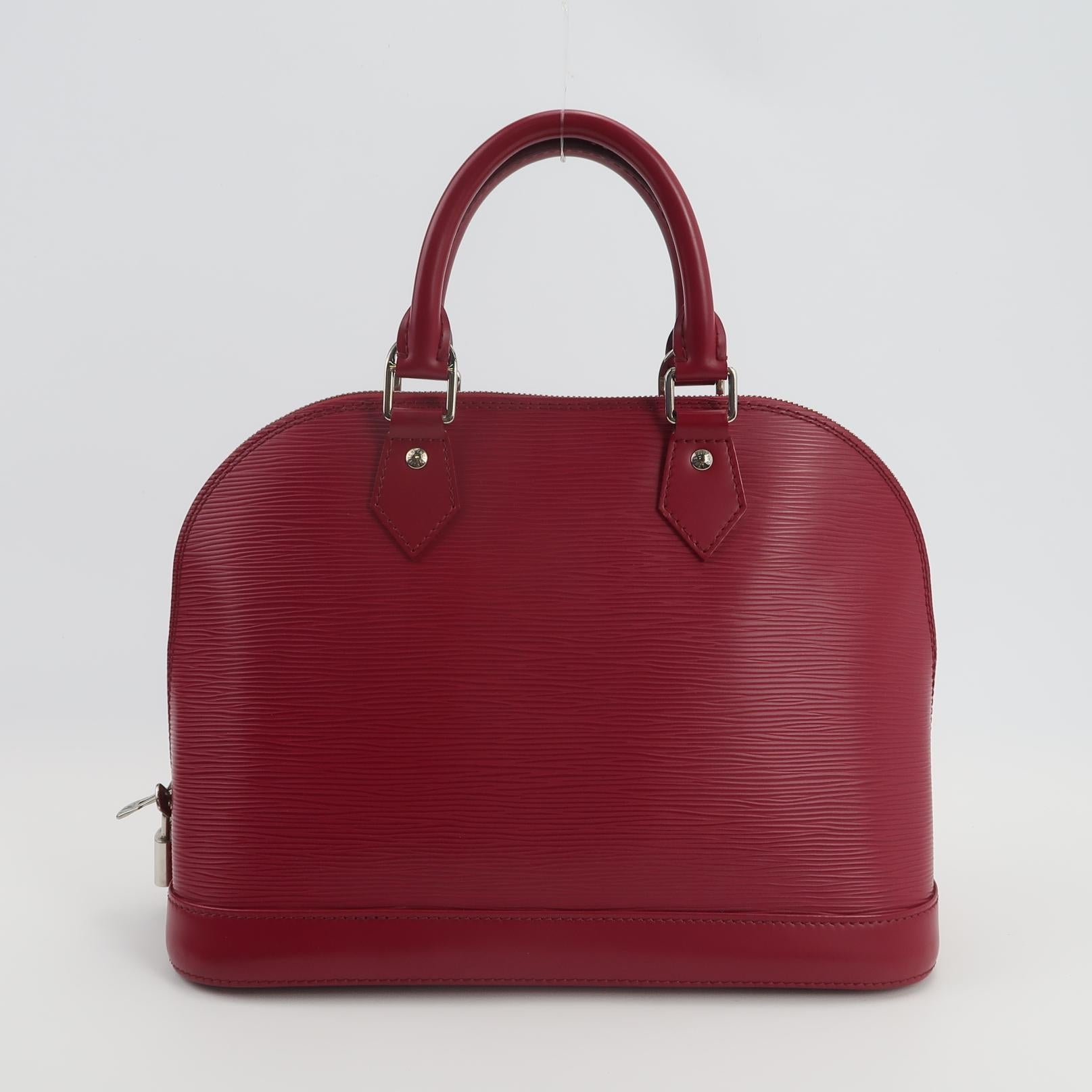 Sac Alma PM vintage en cuir épi bordeaux Louis Vuitton