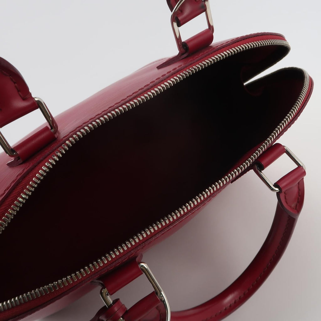 Sac Alma PM vintage en cuir épi bordeaux Louis Vuitton