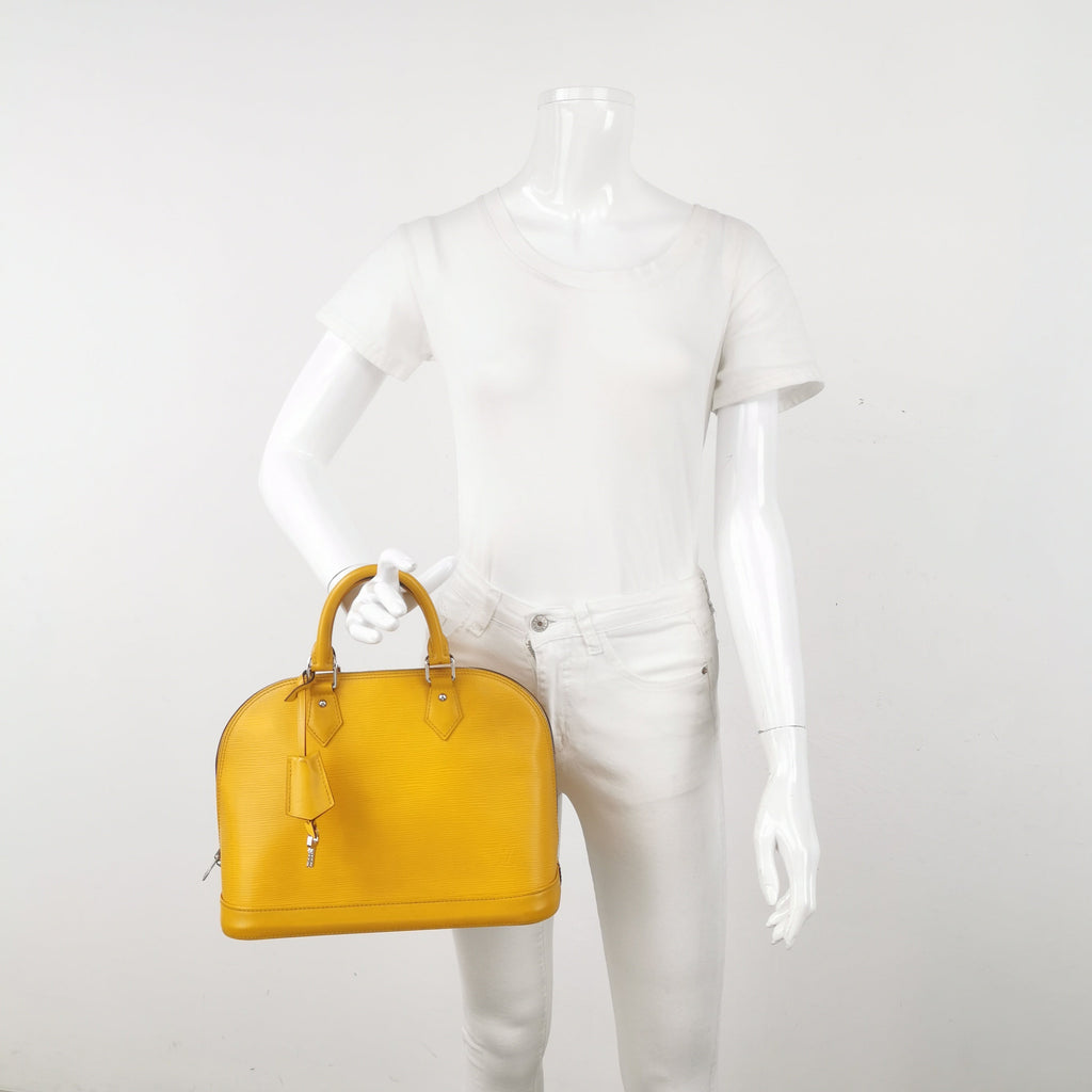Sac Alma PM vintage en cuir épi jaune Louis Vuitton