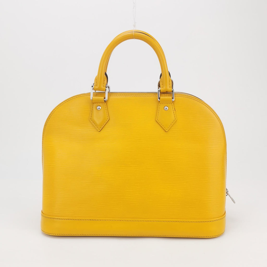 Sac Alma PM vintage en cuir épi jaune Louis Vuitton