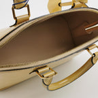 Sac Alma PM vintage en cuir verni beige Louis Vuitton