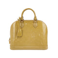 Sac Alma PM vintage en cuir verni beige Louis Vuitton