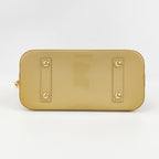 Sac Alma PM vintage en cuir verni beige Louis Vuitton