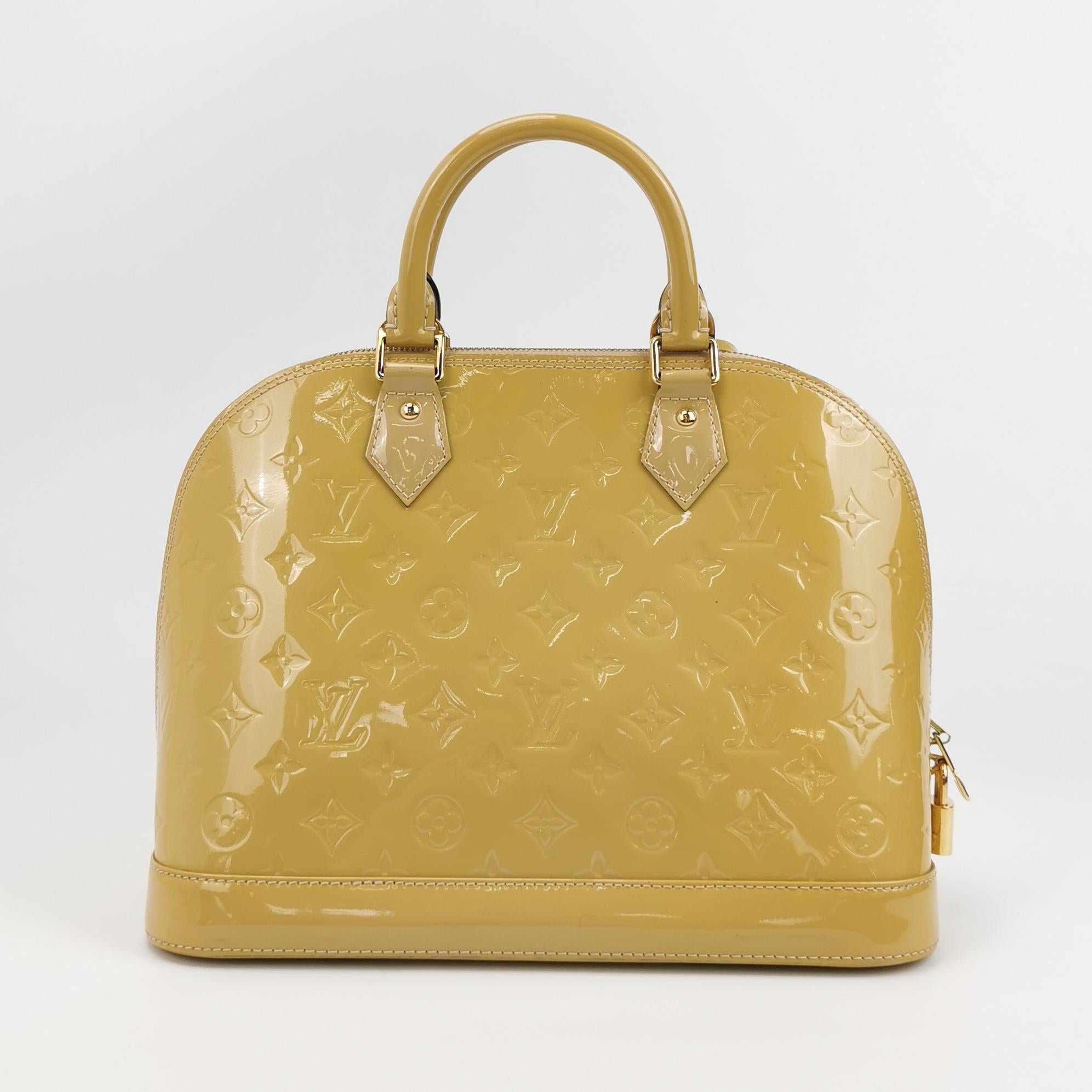 Sac Alma PM vintage en cuir verni beige Louis Vuitton