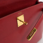 Sac Kelly 32 en cuir rouge H Hermès