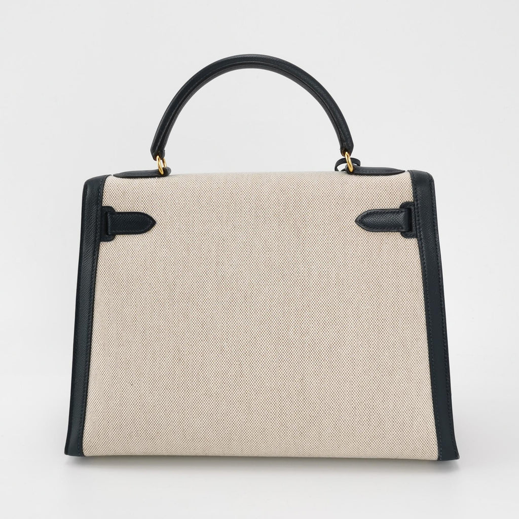 Sac Kelly 32 en toile beige et cuir noir Secondement