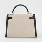 Sac Kelly 32 en toile beige et cuir noir Secondement