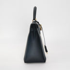 Sac Kelly 32 en toile beige et cuir noir Secondement