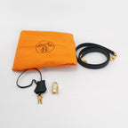 Sac Kelly 32 en toile beige et cuir noir Secondement