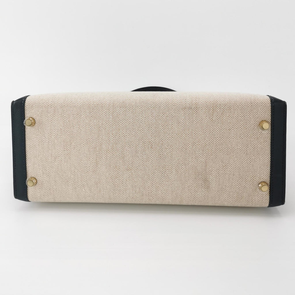 Sac Kelly 32 en toile beige et cuir noir Secondement