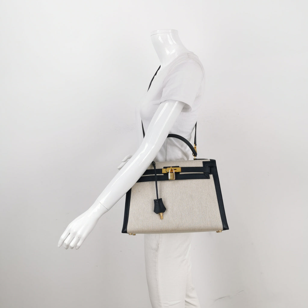 Sac Kelly 32 en toile beige et cuir noir Secondement