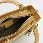 Sac Lady Dior en cuir verni beige Dior