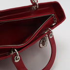 Sac Lady Dior en cuir verni rouge Dior