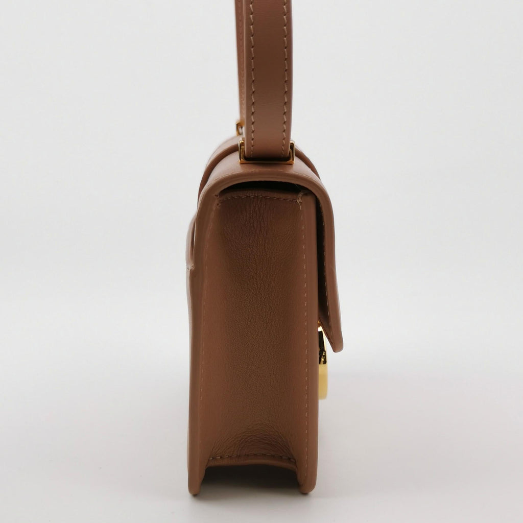 Sac Montaigne 30 Dior en cuir beige Dior